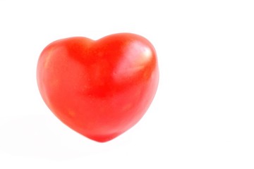 Heart Shaped Tomato on White Background