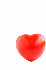 Heart Shaped Tomato on White Background
