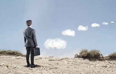 Young businessman in nature