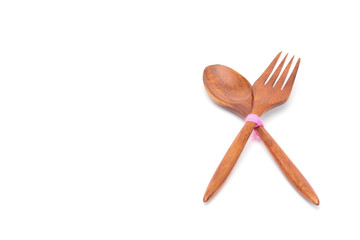 Wooden spoon and fork isolated on white background