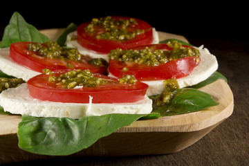 Caprese salad with mozzarella cheese tomatoes and basil