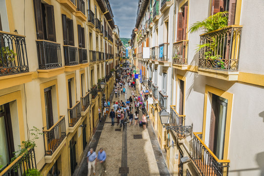 Narrow Street full of people, San Sebastian Old Town - Spain