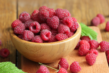Fresh raspberry on the wooden table