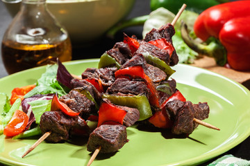 Grilled beef meat and vegetable kebabs