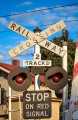 Railway Crossing sign in Australia in late afternoon light