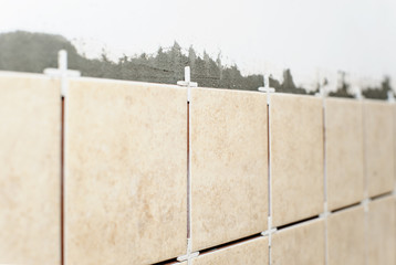 Ceramic tiles on wall.