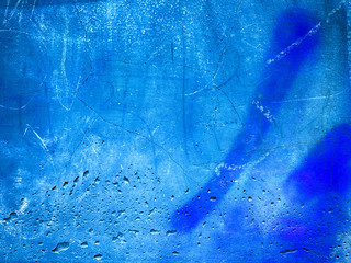 background made with a texture of a blue wall