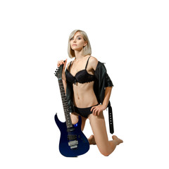 blonde girl with guitar in hands