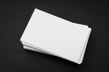 Business cards on black background .