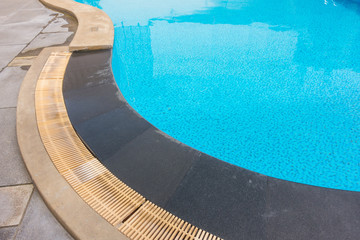 Obraz na płótnie Canvas Blue swimming pool rippled water .