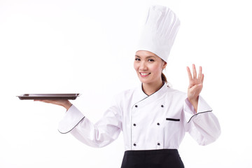 happy, smiling, positive female chef pointing up four fingers