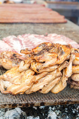 Chicken thighs cooked on the grill.