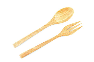 Wooden fork and spoon on a white background