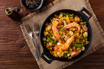 Traditional Spanish paella with seafood and chicken. © gkrphoto