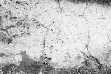 Wall fragment with scratches and cracks