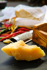 Parmesan cheese. Grated Parmesan cheese. Olive Wood Parmesan Cheese