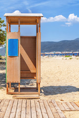 Beach cabin on shore with blu sky