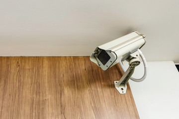 cctv camera security on wall background for safety concept