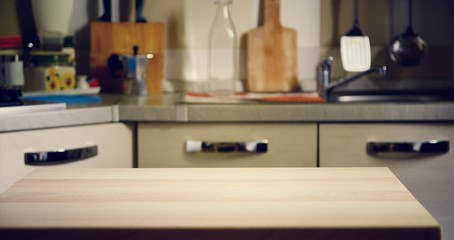 Fototapeta na wymiar Wooden table on blurred background of kitchen