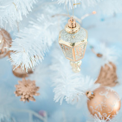 Light Christmas decoration on a blue background