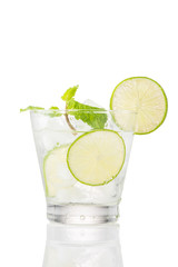 Full glass of water with lemon and mint isolated on white background