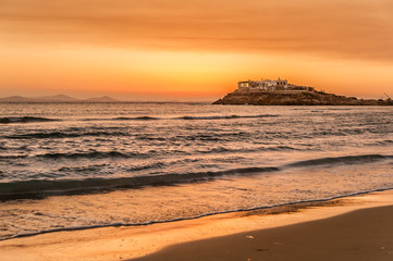 Sunset over the beach of Naxos