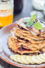 Gluten-free Pancakes with Blueberry Jam and Maple Syrup
