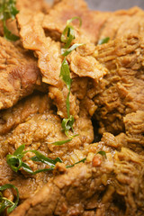 Roasted meat skin texture, close up, selective focus