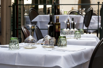 tables of street cafe in the Italian city