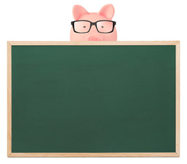 Piggy bank and blackboard