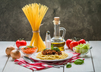 Spaghetti bolognese with ingredients