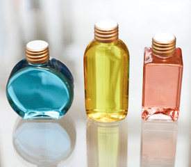 Perfume bottles Blue Red and Yellow