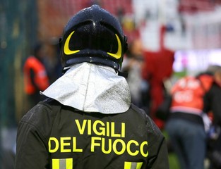Italian firefighter  with the written FIREFIGHTERS