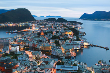 Beautiful super wide-angle summer aerial view of Alesund, Norway, with skyline and scenery beyond...