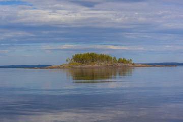 wooden house on the northern rocky shore