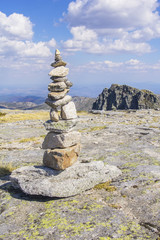 background  of Pyramid from stones and view from the top of the hill in the nature reserve of Sierra de Estrela in  Portugal