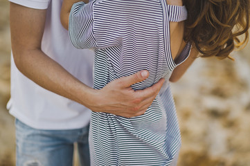 The gentle embrace of a young couple 6552.