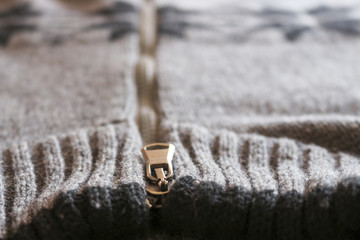 Warm men's sweater with ornament.