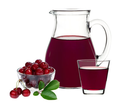 cherry juice in a glass and carafe