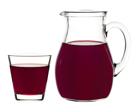 cherry juice in a glass and carafe