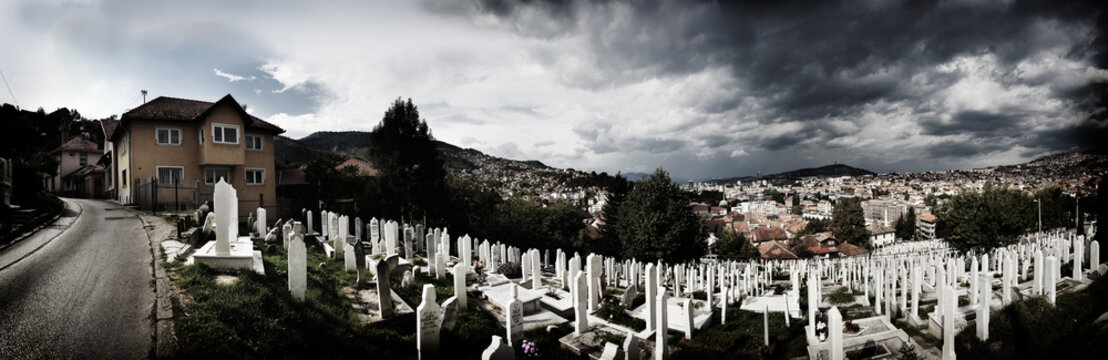 View of cemetery against cloudy sky