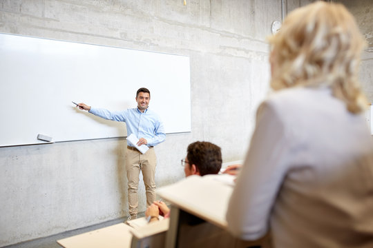 group of students and teacher at lecture