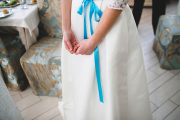 beautiful and delicate hands and dress bride