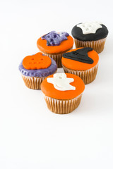 Halloween cupcakes isolated on white background

