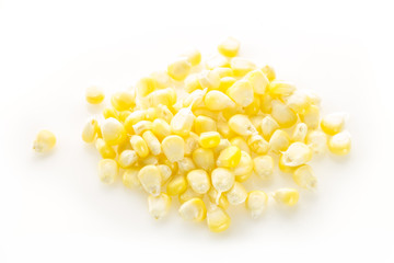 Heap of corn kernels, on white background.
