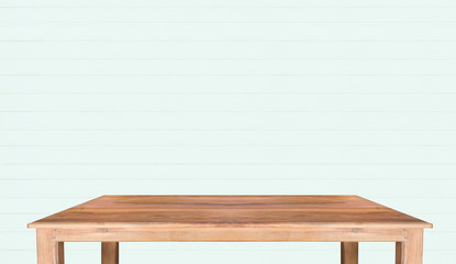 Empty top wooden table and green wooden wall background. For product display