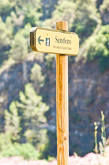 yellow billboard at countryside