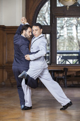 Tango Dancers Performing Gancho Step