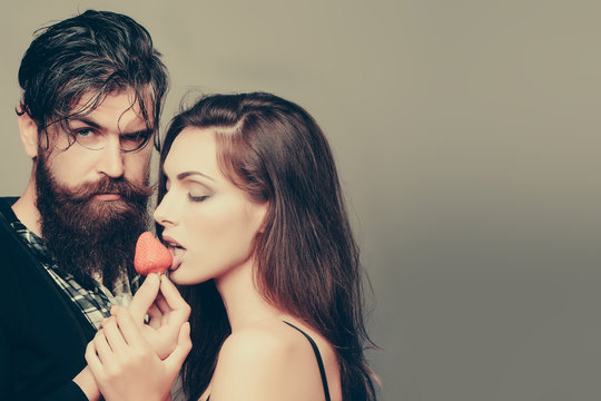 Sexy Couple Eating Red Strawberry