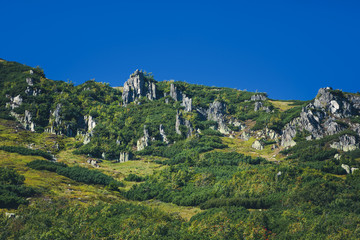 Fototapeta na wymiar Mountain landscape with blue sky copy space.